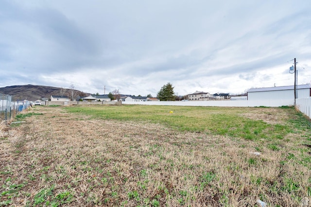 6102 W 13400 S, Herriman, UT 84096 - view of yard featuring fence and a mountain view