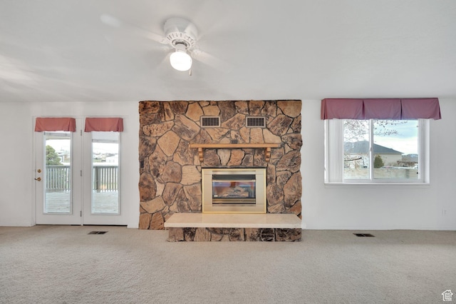 6102 W 13400 S, Herriman, UT 84096 - unfurnished living room featuring visible vents, carpet flooring, and a fireplace