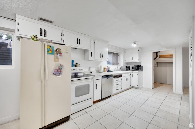 6102 W 13400 S, Herriman, UT 84096 - kitchen featuring white cabinetry, light countertops, light tile patterned flooring, visible vents, and appliances with stainless steel finishes