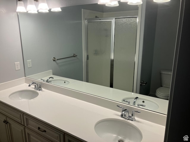 285 W 1580 N Unit 102, Logan, UT 84341 - bathroom featuring a stall shower and a sink