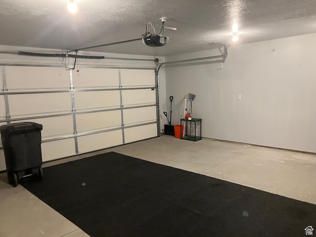 285 W 1580 N Unit 102, Logan, UT 84341 - garage featuring a garage door opener