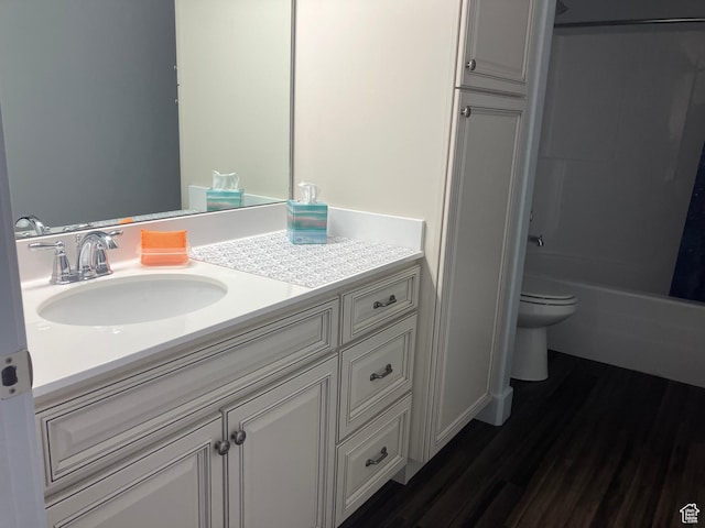 285 W 1580 N Unit 102, Logan, UT 84341 - full bathroom with toilet, vanity, shower / bath combination, and wood finished floors