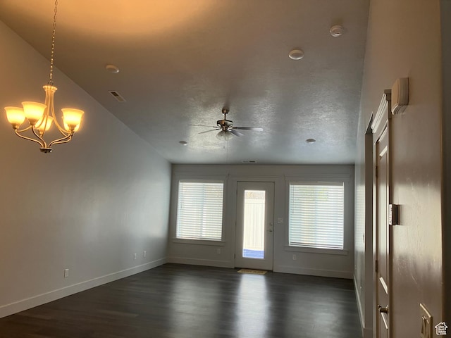 285 W 1580 N Unit 102, Logan, UT 84341 - empty room featuring a textured ceiling, baseboards, ceiling fan with notable chandelier, visible vents, and dark wood-style flooring