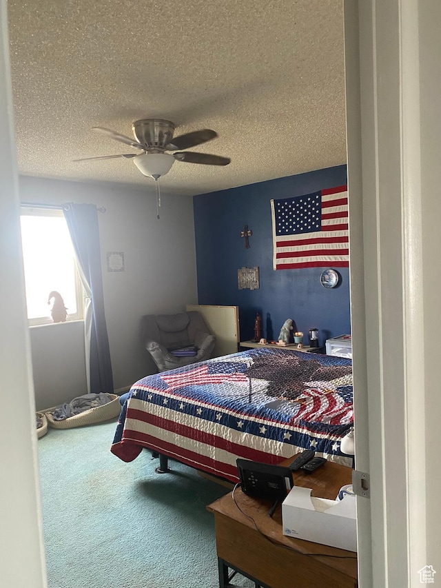 6489 W Castle View Dr S, West Valley City, UT 84128 - bedroom with ceiling fan, carpet, and a textured ceiling