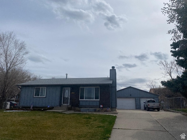 6489 W Castle View Dr S, West Valley City, UT 84128 - single story home with a chimney, a garage, a front yard, board and batten siding, and an outdoor structure