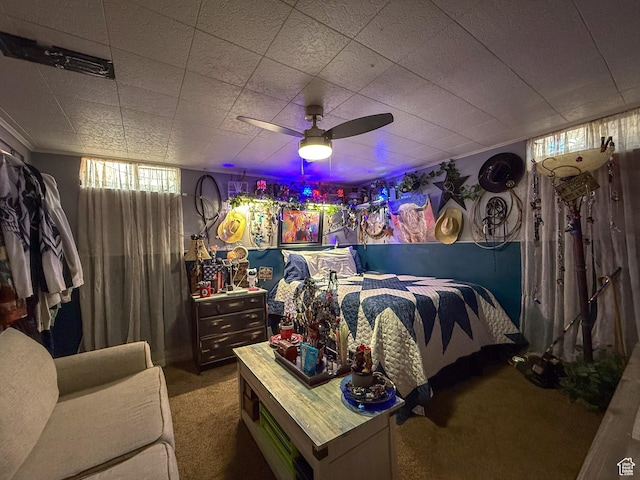 carpeted bedroom featuring a ceiling fan