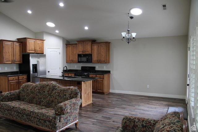 1660 N 475 E, North Ogden, UT 84404 - kitchen with stainless steel refrigerator with ice dispenser, gas range, a sink, dark countertops, and black microwave