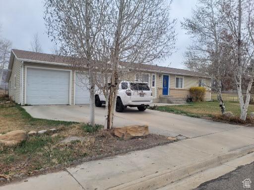 805 N Valley View Dr W, Castle Dale, UT 84513 - ranch-style home with a garage