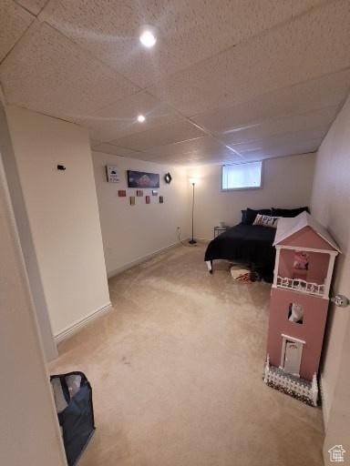 805 N Valley View Dr W, Castle Dale, UT 84513 - bedroom with light carpet, baseboards, and a paneled ceiling