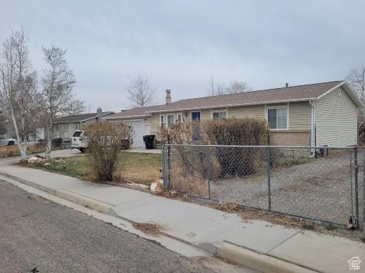 805 N Valley View Dr W, Castle Dale, UT 84513 - single story home with a fenced front yard