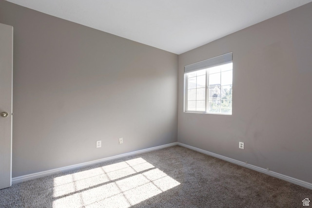 1476 W Brunello Dr S Unit C-5, Bluffdale, UT 84065 - spare room featuring carpet and baseboards