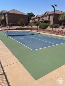 3155 S Hidden Valley Dr Unit 331, St George, UT 84790 - view of tennis court with a residential view, fence, and community basketball court