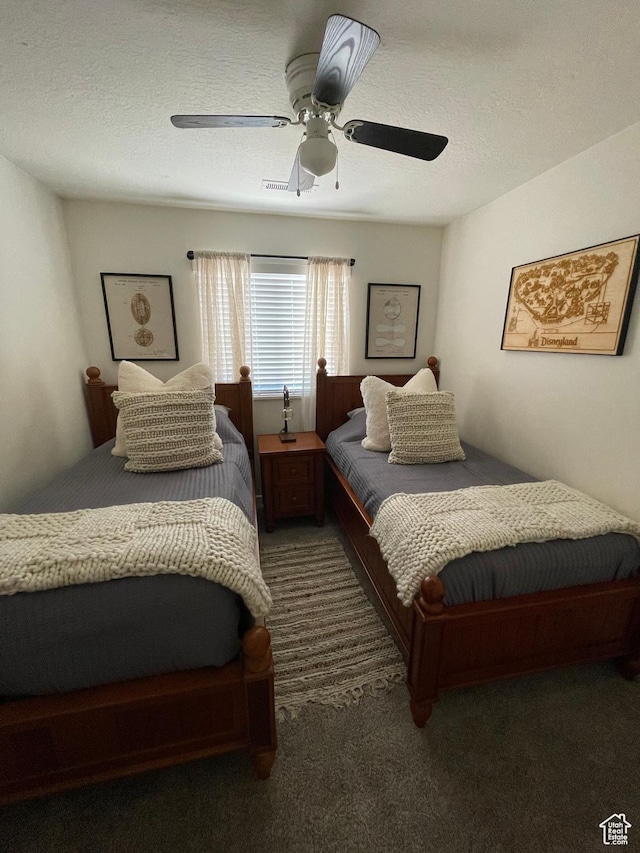 3155 S Hidden Valley Dr Unit 331, St George, UT 84790 - carpeted bedroom featuring visible vents, ceiling fan, and a textured ceiling