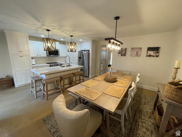 3155 S Hidden Valley Dr Unit 331, St George, UT 84790 - dining area featuring baseboards, a chandelier, recessed lighting, and light wood-style floors