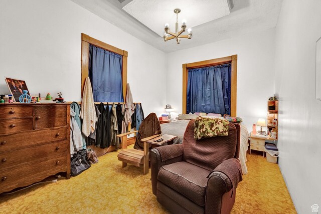 477 N 300 W, Brigham City, UT 84302 - bedroom with an inviting chandelier and light colored carpet