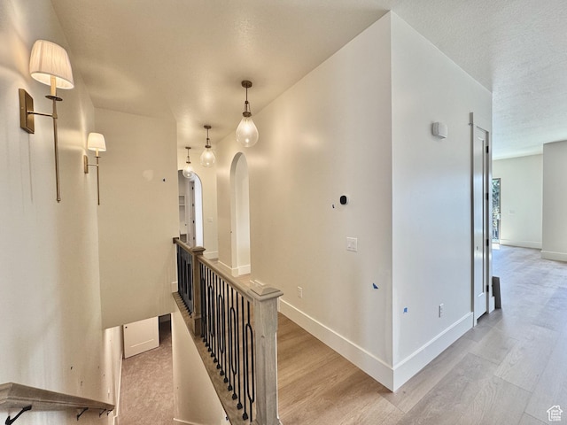 1065 W 125 S, Lehi, UT 84043 - corridor featuring light wood-style flooring, baseboards, and an upstairs landing