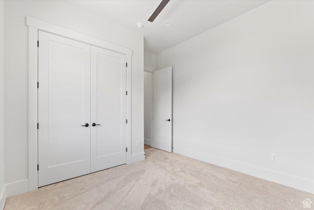1065 W 125 S, Lehi, UT 84043 - unfurnished bedroom featuring carpet floors, a closet, a ceiling fan, and baseboards