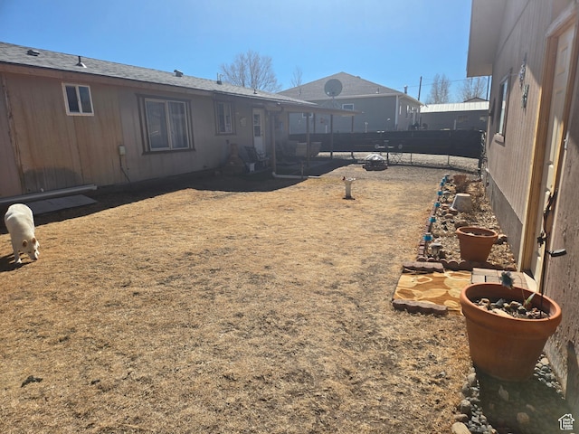 view of yard featuring fence