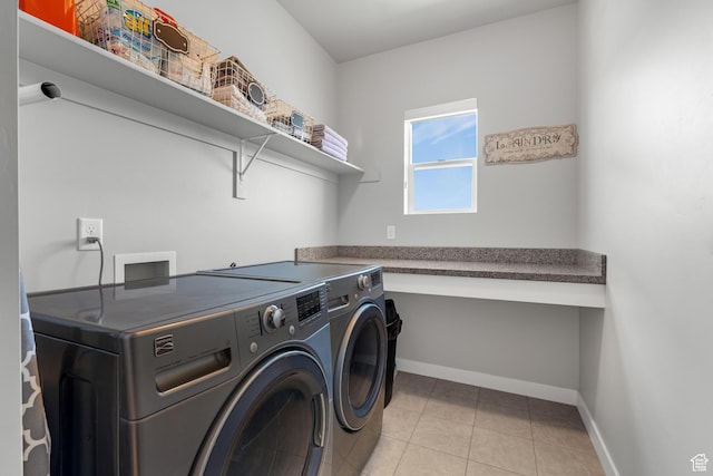 3032 W Cramden Dr, Lehi, UT 84043 - washroom with light tile patterned floors, washer and clothes dryer, baseboards, and laundry area