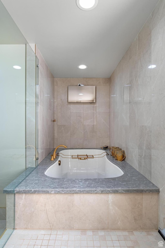 3032 W Cramden Dr, Lehi, UT 84043 - bathroom featuring tile walls and a garden tub