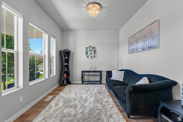 3032 W Cramden Dr, Lehi, UT 84043 - living area featuring baseboards, visible vents, and wood finished floors