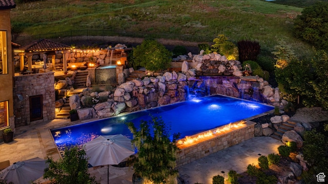 4757 Hidden Lake Dr, Bountiful, UT 84010 - view of pool with fence, an outdoor stone fireplace, a patio, and a hot tub