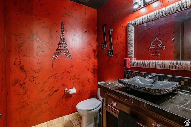 4757 Hidden Lake Dr, Bountiful, UT 84010 - bathroom featuring toilet, vanity, and stone tile flooring