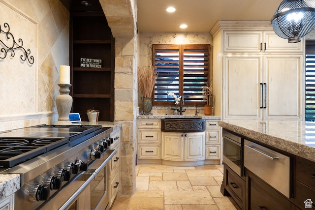 4757 Hidden Lake Dr, Bountiful, UT 84010 - kitchen featuring range with two ovens, stone tile floors, recessed lighting, and light stone counters