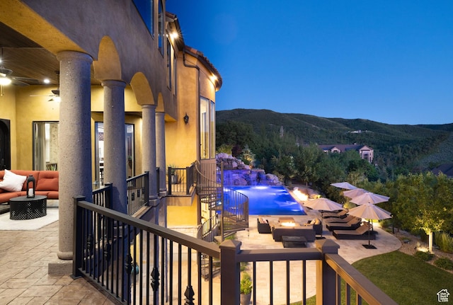 4757 Hidden Lake Dr, Bountiful, UT 84010 - exterior space featuring outdoor lounge area, a mountain view, a ceiling fan, and an outdoor pool