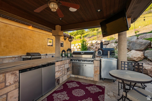 4757 Hidden Lake Dr, Bountiful, UT 84010 - view of patio with a grill, fence, an outdoor kitchen, and a ceiling fan