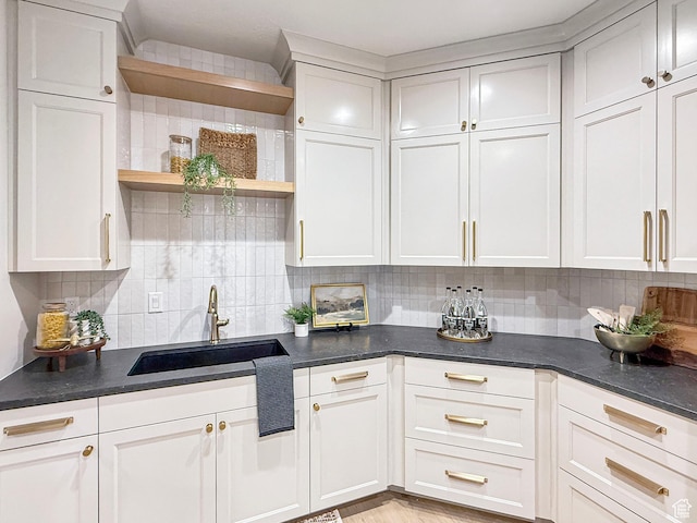 4014 N Dillon Way N, Ogden, UT 84414 - kitchen with dark countertops, tasteful backsplash, a sink, and open shelves