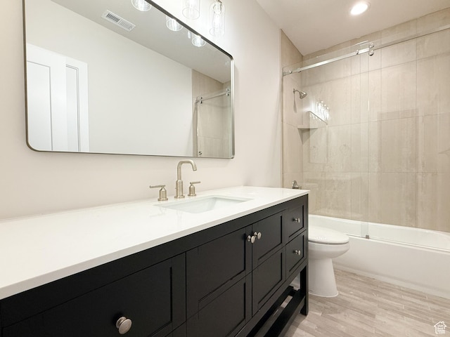 4014 N Dillon Way N, Ogden, UT 84414 - full bath with toilet, vanity, shower / washtub combination, wood finished floors, and visible vents