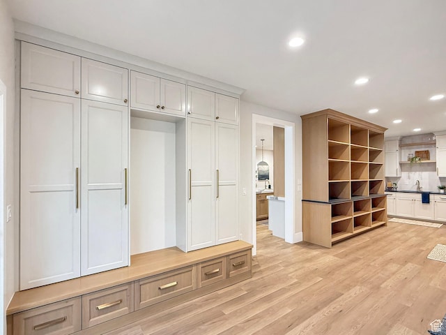 4014 N Dillon Way N, Ogden, UT 84414 - interior space featuring a sink, recessed lighting, and light wood-type flooring