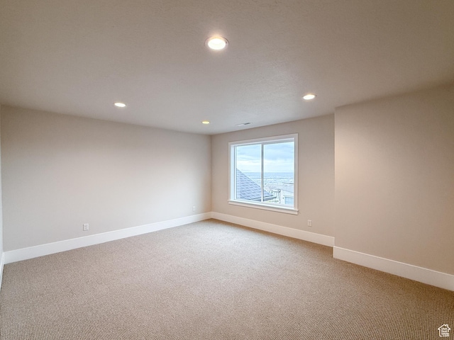 4014 N Dillon Way N, Ogden, UT 84414 - empty room with baseboards, light colored carpet, and recessed lighting