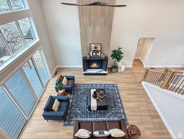 4014 N Dillon Way N, Ogden, UT 84414 - living area featuring a towering ceiling and wood finished floors