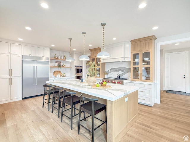 4014 N Dillon Way N, Ogden, UT 84414 - kitchen featuring light wood-style floors, stainless steel appliances, a spacious island, and open shelves