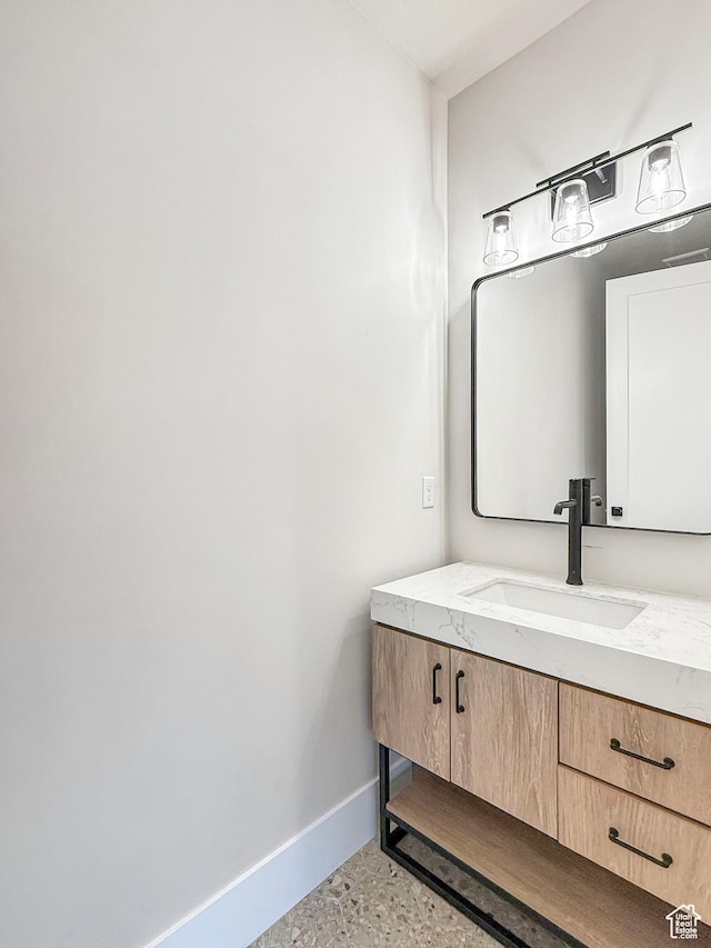 4014 N Dillon Way N, Ogden, UT 84414 - bathroom with vanity and baseboards