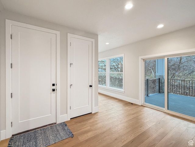 4014 N Dillon Way N, Ogden, UT 84414 - interior space with light wood finished floors, baseboards, visible vents, and recessed lighting