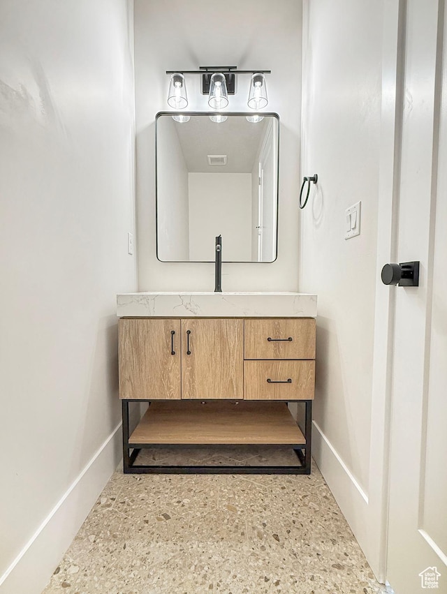 4014 N Dillon Way N, Ogden, UT 84414 - bathroom with baseboards and vanity