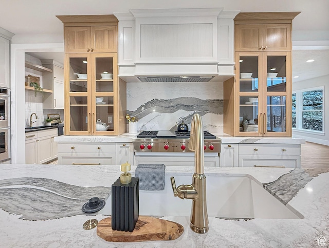 4014 N Dillon Way N, Ogden, UT 84414 - kitchen with glass insert cabinets, light stone countertops, decorative backsplash, and a sink