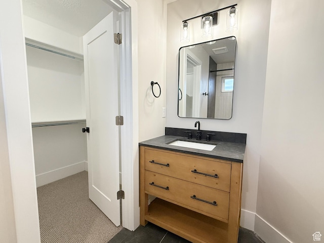 4014 N Dillon Way N, Ogden, UT 84414 - bathroom featuring baseboards and vanity
