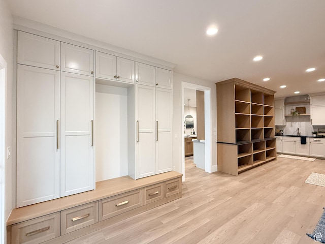 4014 N Dillon Way N, Ogden, UT 84414 - mudroom featuring recessed lighting, light wood-style floors, and a sink