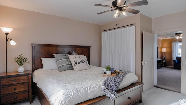bedroom featuring carpet flooring and a ceiling fan