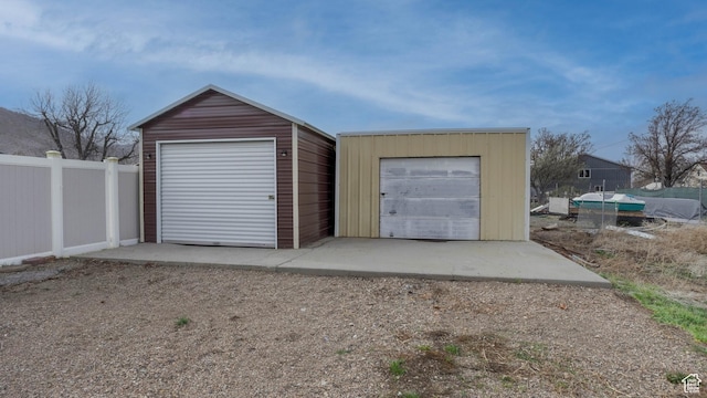 garage with fence