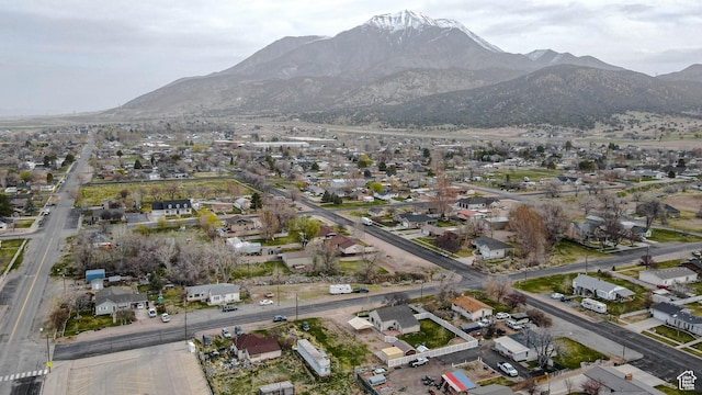 drone / aerial view featuring a mountain view and a residential view