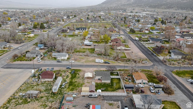 bird's eye view featuring a residential view and a mountain view