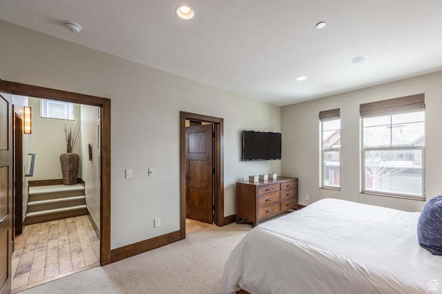 853 W Benjamin Pl, Kamas, UT 84036 - bedroom with baseboards, light carpet, and multiple windows