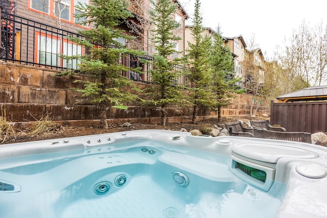 853 W Benjamin Pl, Kamas, UT 84036 - view of swimming pool featuring fence and a hot tub