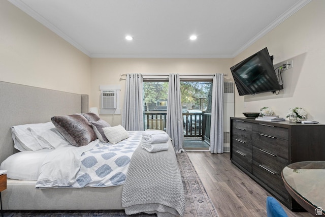 2285 Sidewinder Dr Unit 702, Park City, UT 84060 - bedroom with ornamental molding, an AC wall unit, access to outside, and wood finished floors