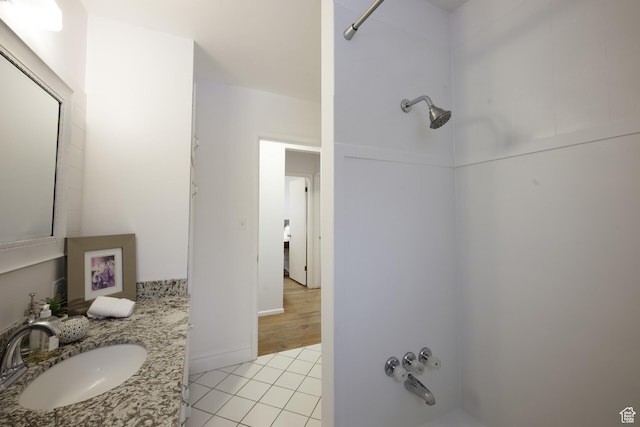 bathroom featuring tile patterned floors and vanity